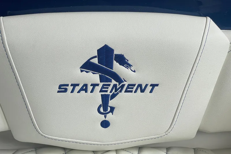 Slide: The Image of 2027 Statement 350 Open logo on white leather upholstery. - 15