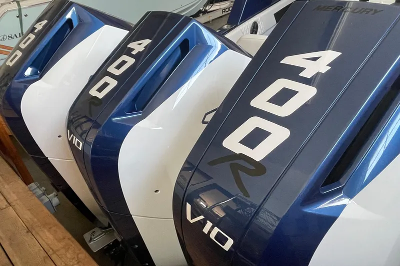 Slide: The Image of Three Mercury 400R V10 outboard engines on a Statement 350 Open, 2027 model. - 6