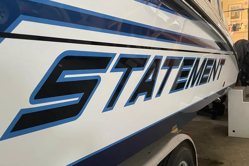 Slide: The Image of Side view of 2027 Statement 350 Open boat with bold lettering. - 8