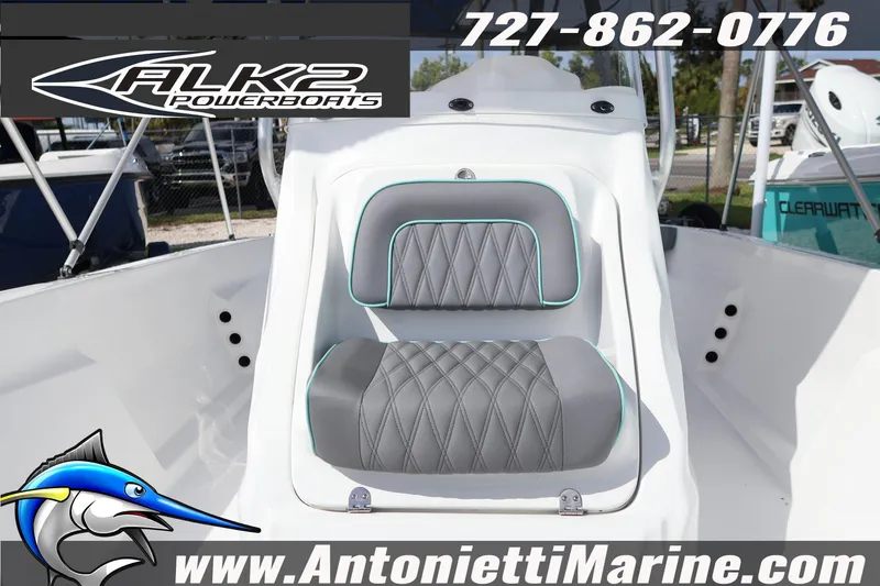 Slide: The Image of 2026 ALK2 Powerboats 22 CRS with stylish seating and marine branding. - 11