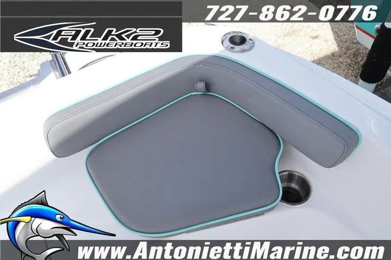 Slide: The Image of 2026 ALK2 Powerboats 22 CRS seating area with gray cushions and teal trim. - 14