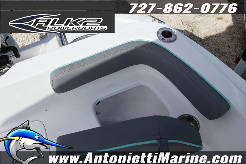 Slide: The Image of 2026 ALK2 Powerboats 22 CRS interior seating with logo and contact details. - 15