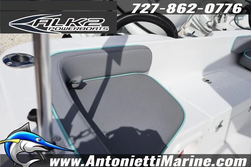 Slide: The Image of ALK2 Powerboats 22 CRS 2026 model interior with gray seating and turquoise accents. - 5