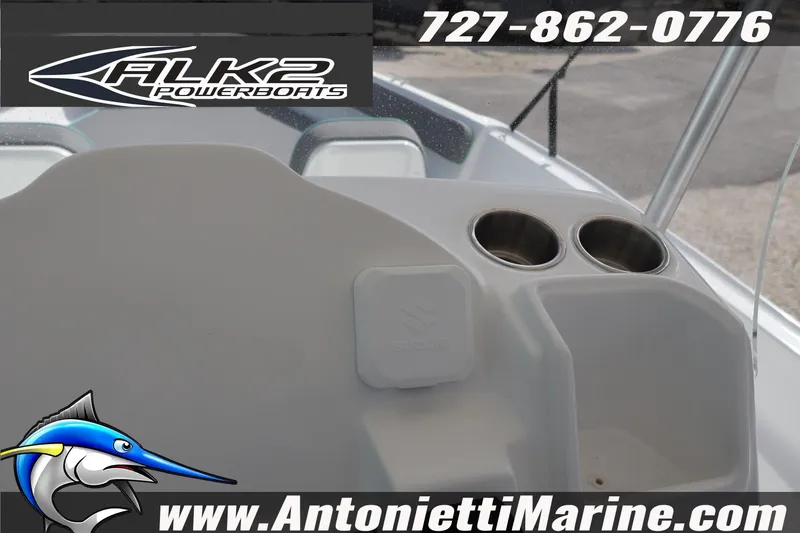 Slide: The Image of 2026 ALK2 Powerboats 22 CRS dashboard with cup holders and logo. - 8