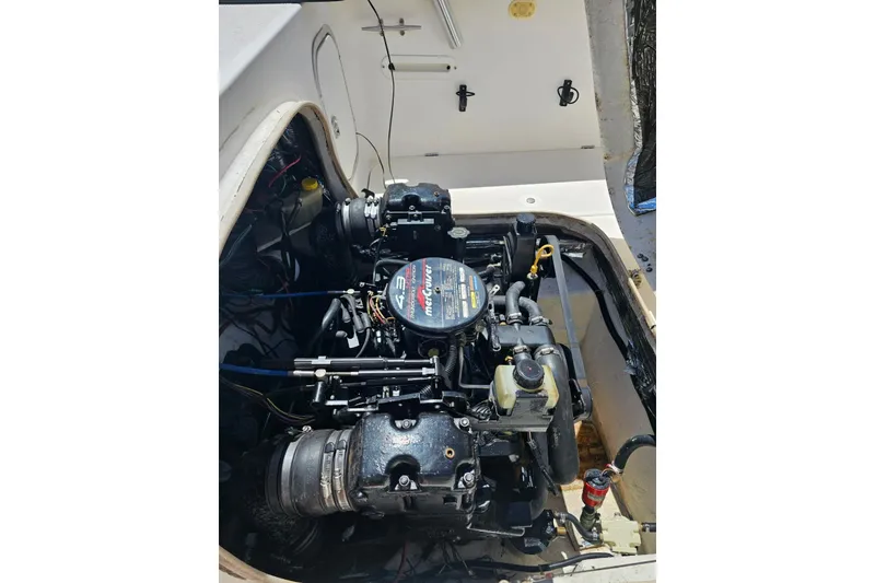 Slide: The Image of Engine compartment of a 1999 Bayliner 1802 Trophy boat with MerCruiser 4.3L engine. - 14