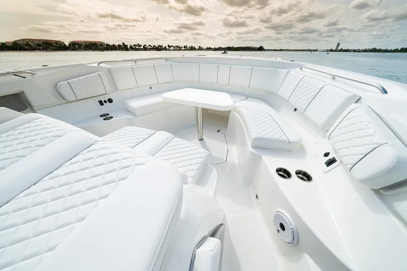 Slide: The Image of Manufacturer Provided Image: Luxurious seating area on the 2021 Pursuit S 378 Sport boat. - 7