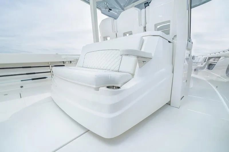 Slide: The Image of Manufacturer Provided Image: 2021 Pursuit S 378 Sport boat interior with white seating and modern design. - 9