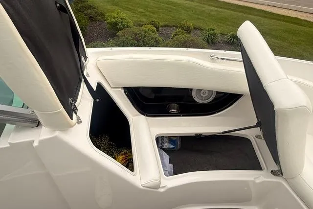 Slide: The Image of 2007 Regal 2200 Bowrider interior storage compartments and seating detail. - 14