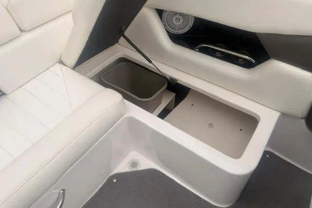 Slide: The Image of 2007 Regal 2200 Bowrider interior storage compartments and seating area. - 17