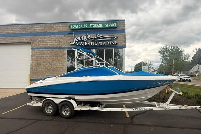 Slide: The Image of 2007 Regal 2200 Bowrider boat on trailer at Jerry's Majestic Marine dealership. - 31