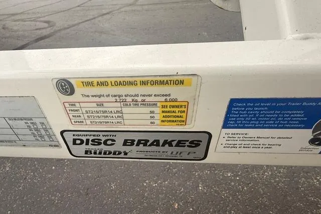 Slide: The Image of Tire and loading information label on a 2007 Regal 2200 Bowrider trailer. - 37