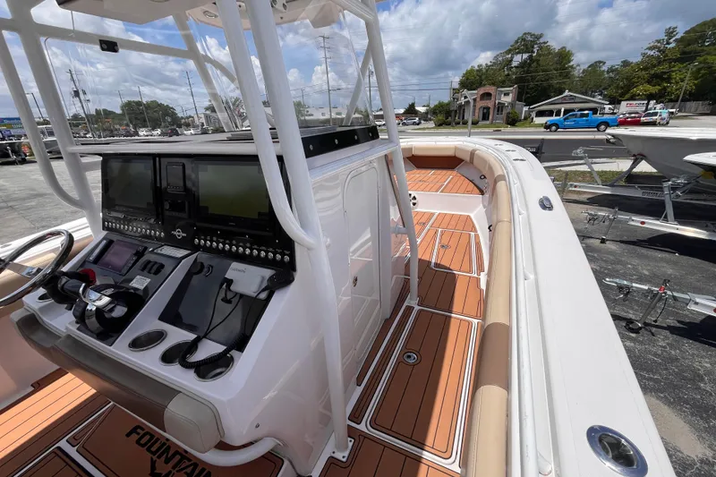 Slide: The Image of 2019 Fountain 38 Center Console boat with advanced navigation system and spacious deck. - 12