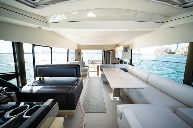 Slide: The Image of Luxurious interior of 2023 Prestige 520S yacht with panoramic ocean views. - 11