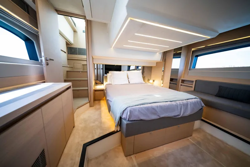 Slide: The Image of Luxurious interior of 2023 Prestige 520S yacht with modern bedroom design. - 4