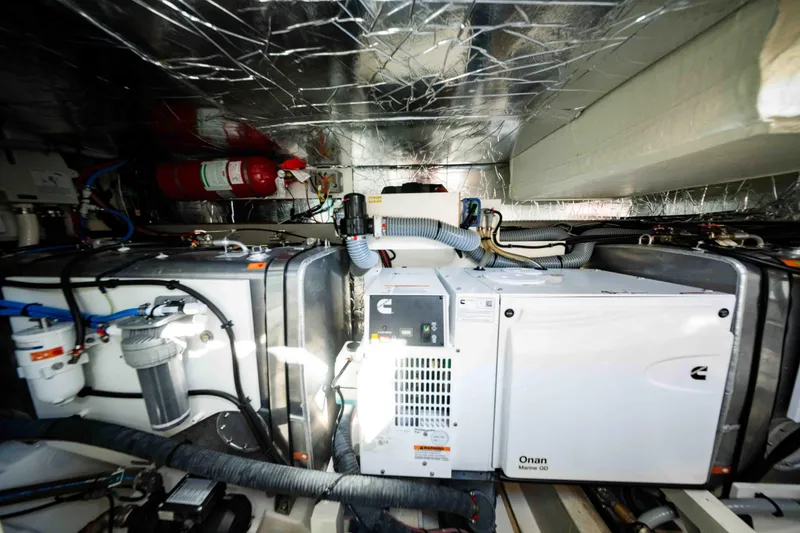 Slide: The Image of Engine room of 2023 Prestige 520S yacht with Onan Marine generator and equipment. - 6