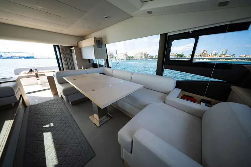 Slide: The Image of Luxurious interior of 2023 Prestige 520S yacht with waterfront view. - 8