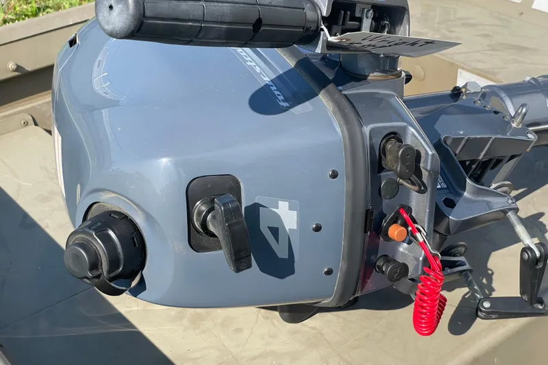 Slide: The Image of 2020 G3 Gator Tough 1036 boat motor with control handle and safety cord. - 5