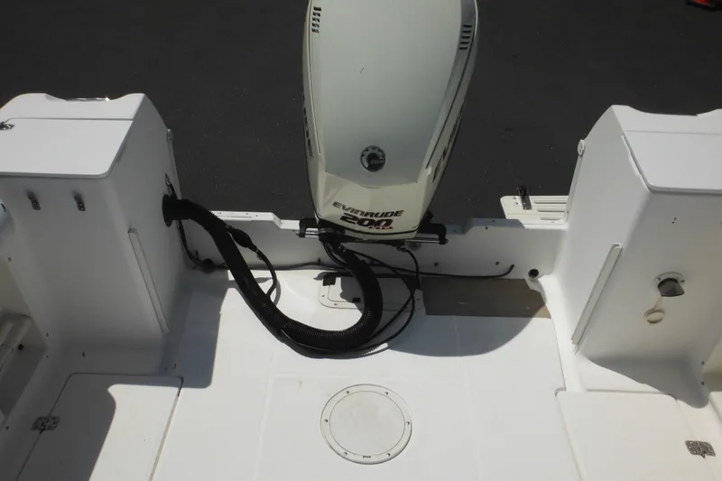 Slide: The Image of 1998 Wellcraft 23 Excel boat with Evinrude 200 outboard motor, rear deck view. - 16