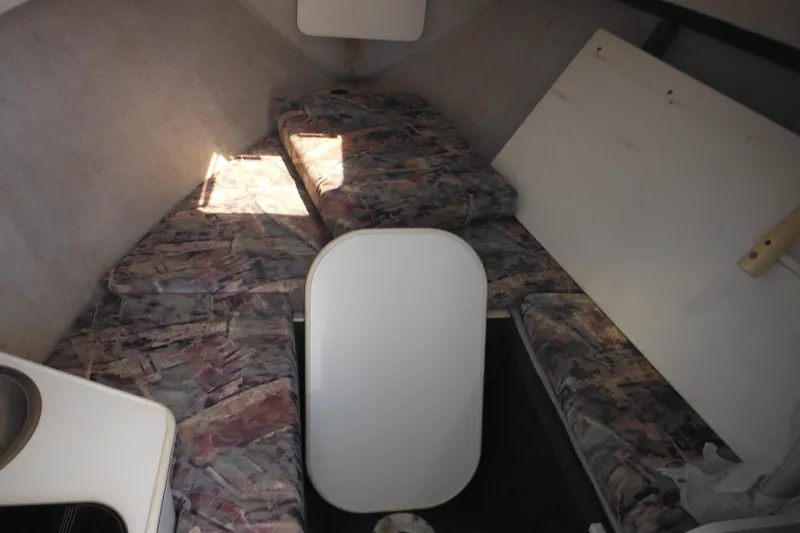 Slide: The Image of Interior cabin of a 1998 Wellcraft 23 Excel boat with patterned seating. - 35