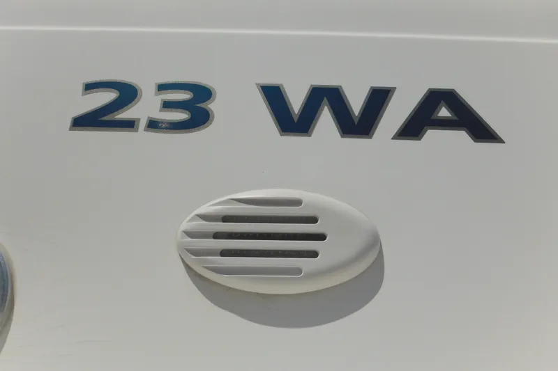 Slide: The Image of Close-up of 1998 Wellcraft 23 Excel boat model name and vent detail. - 47