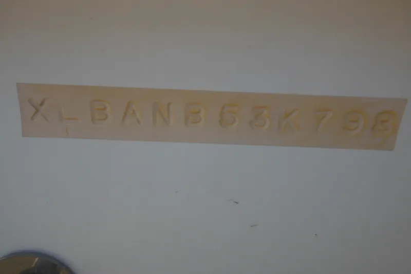 Slide: The Image of Hull identification number on 1998 Wellcraft 23 Excel boat. - 9