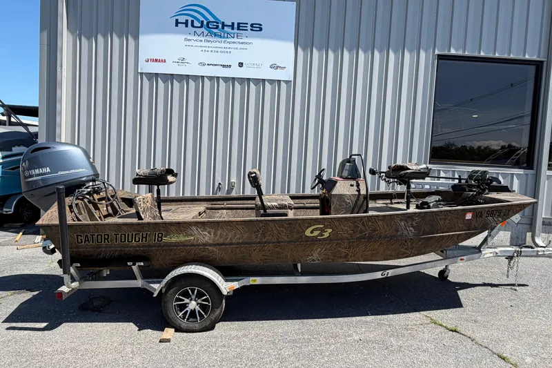 The Image of 2023 G3 Gator Tough 18 CCJ boat on trailer outside Hughes Marine. - 1