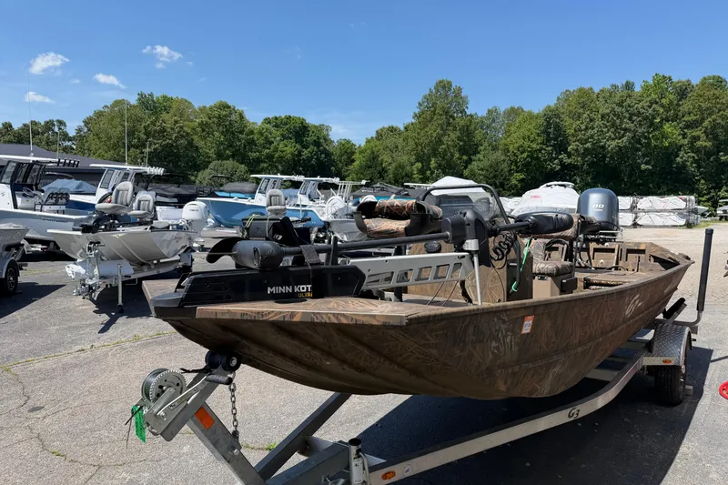Slide: The Image of 2023 G3 Gator Tough 18 CCJ boat on trailer in outdoor lot. - 4