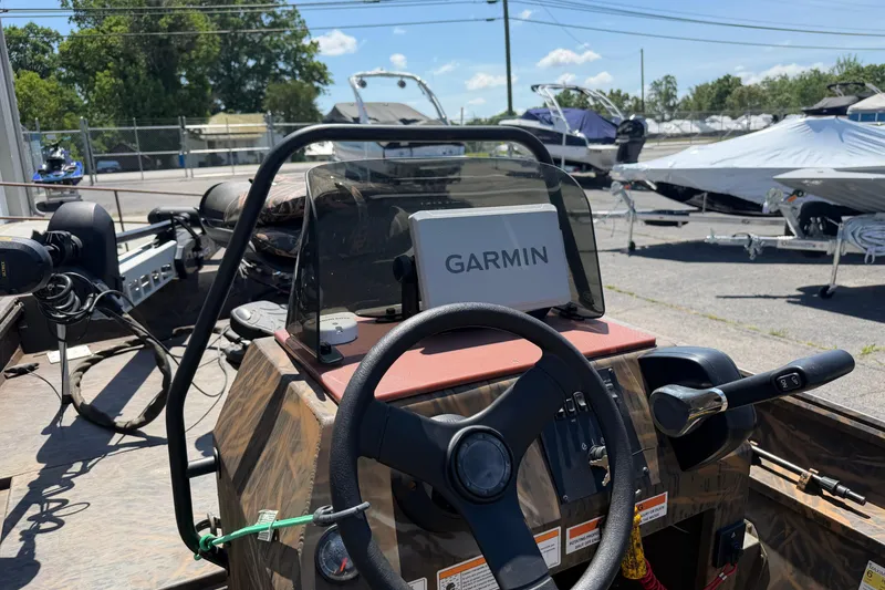 Slide: The Image of 2023 G3 Gator Tough 18 CCJ boat with Garmin navigation system. - 6