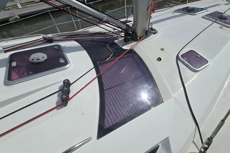 Slide: The Image of Deck of 2011 Jeanneau Sun Odyssey 50 DS sailboat with hatches and rigging. - 10
