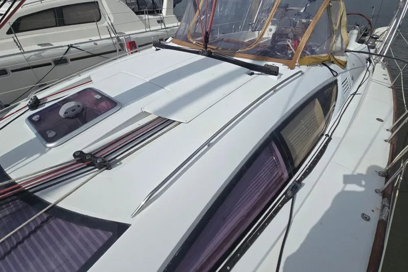 Slide: The Image of 2011 Jeanneau Sun Odyssey 50 DS sailboat deck with rigging and cockpit view. - 20