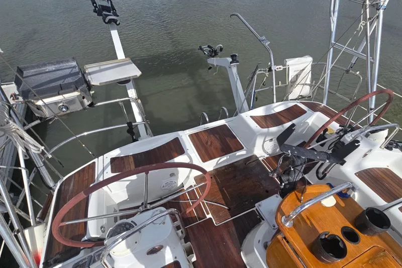 Slide: The Image of Cockpit view of 2011 Jeanneau Sun Odyssey 50 DS sailboat with dual steering wheels. - 30