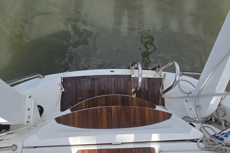 Slide: The Image of Stern view of 2011 Jeanneau Sun Odyssey 50 DS yacht with wooden deck. - 31