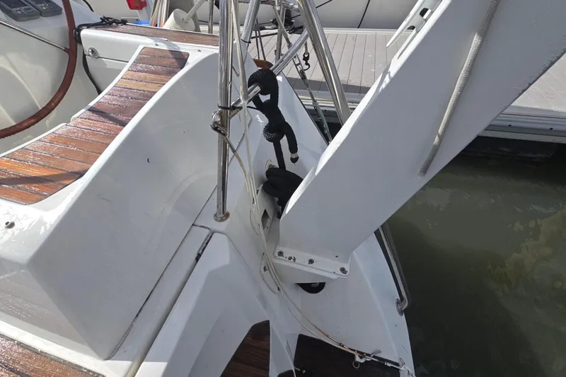 Slide: The Image of Jeanneau Sun Odyssey 50 DS 2011 yacht deck with wooden accents and rigging. - 35