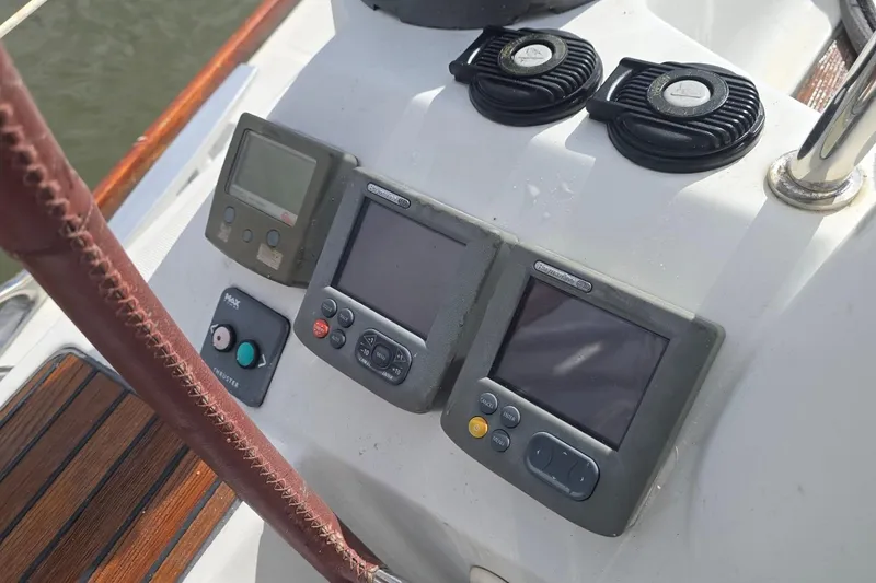 Slide: The Image of Control panel of 2011 Jeanneau Sun Odyssey 50 DS sailboat with navigation instruments. - 39