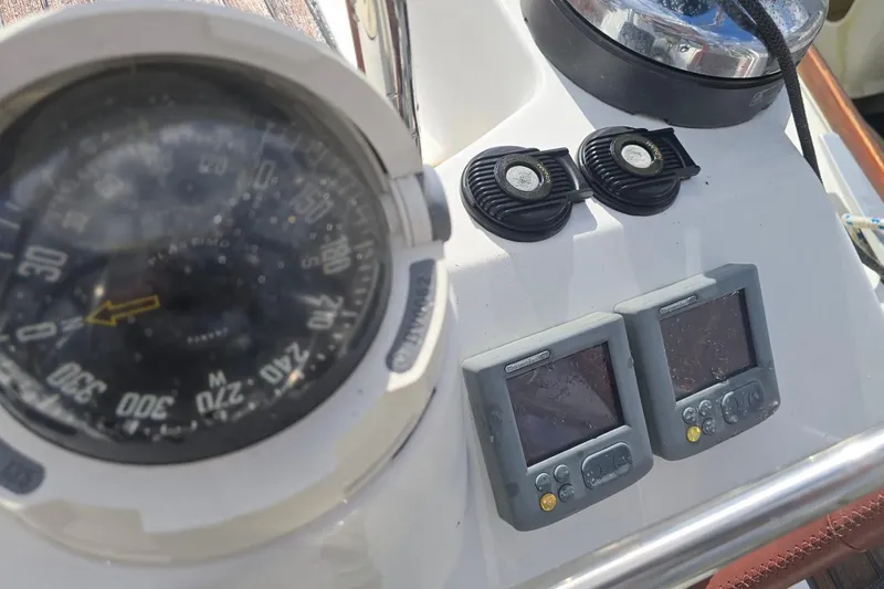 Slide: The Image of Compass and navigation instruments on 2011 Jeanneau Sun Odyssey 50 DS yacht. - 40