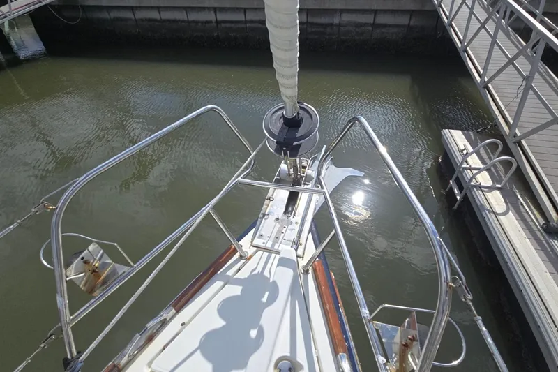 Slide: The Image of Bow view of 2011 Jeanneau Sun Odyssey 50 DS docked in marina. - 43