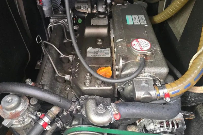 Slide: The Image of Engine of a 2011 Jeanneau Sun Odyssey 50 DS sailboat, showcasing mechanical components. - 47