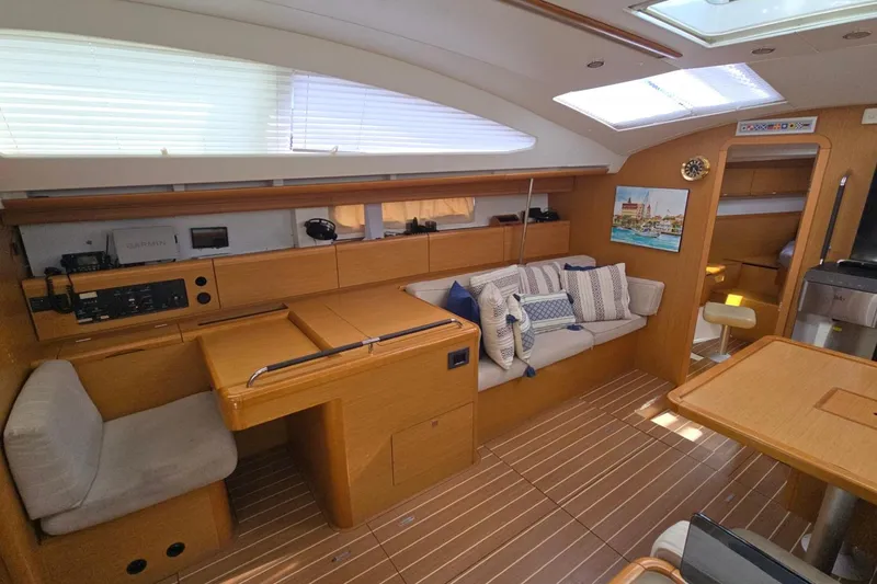 Slide: The Image of Interior of 2011 Jeanneau Sun Odyssey 50 DS yacht, featuring cozy seating and modern amenities. - 56