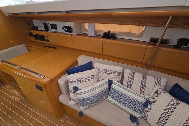 Slide: The Image of Interior of 2011 Jeanneau Sun Odyssey 50 DS with cozy seating and nautical decor. - 57