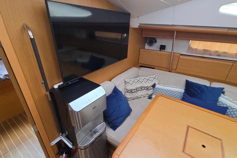 Slide: The Image of Interior of 2011 Jeanneau Sun Odyssey 50 DS yacht with cozy seating and modern amenities. - 59