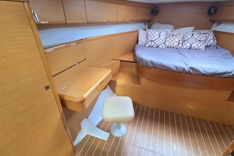 Slide: The Image of Luxurious cabin interior of 2011 Jeanneau Sun Odyssey 50 DS yacht with wooden finish. - 61