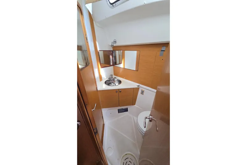 Slide: The Image of Interior of 2011 Jeanneau Sun Odyssey 50 DS yacht bathroom with sink and mirror. - 67