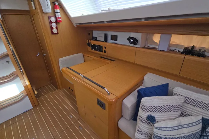 Slide: The Image of Interior of 2011 Jeanneau Sun Odyssey 50 DS yacht with wooden cabinetry and seating. - 72