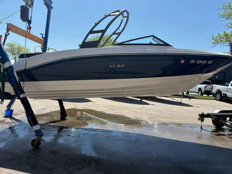 Slide: The Image of 2023 Sea Ray SPX 210 boat on a hoist. - 3