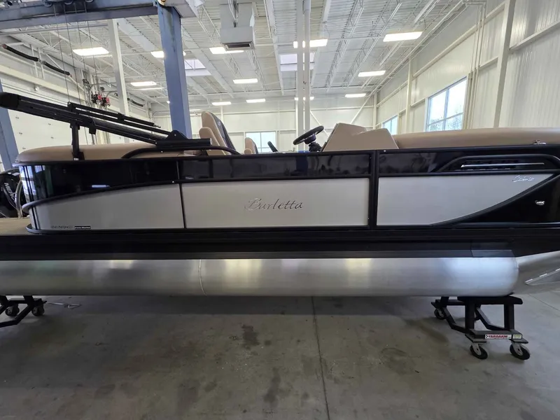The Image of 2026 Barletta Cabrio 22QC pontoon boat in a showroom. - 1
