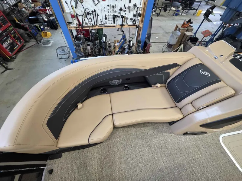 Slide: The Image of Interior of 2026 Barletta Cabrio 22QC with beige leather seating. - 13