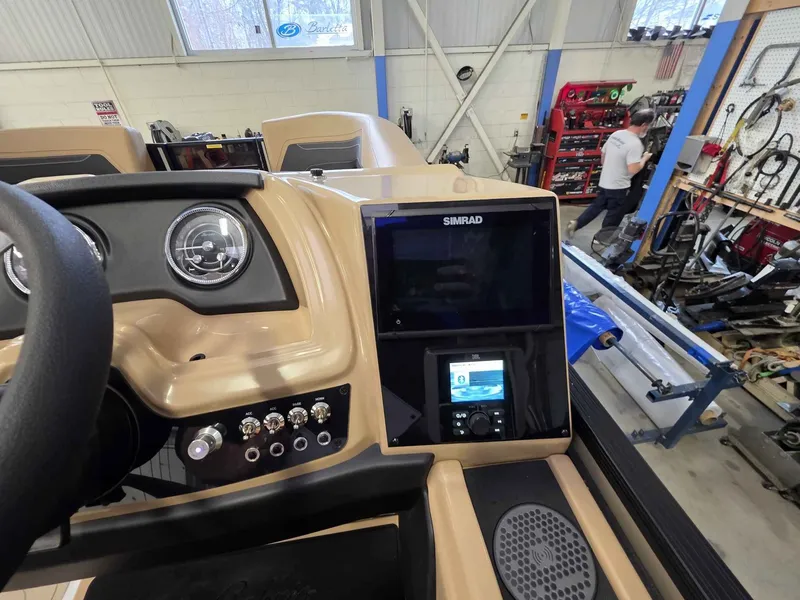 Slide: The Image of Interior view of 2026 Barletta Cabrio 22QC with Simrad display. - 16