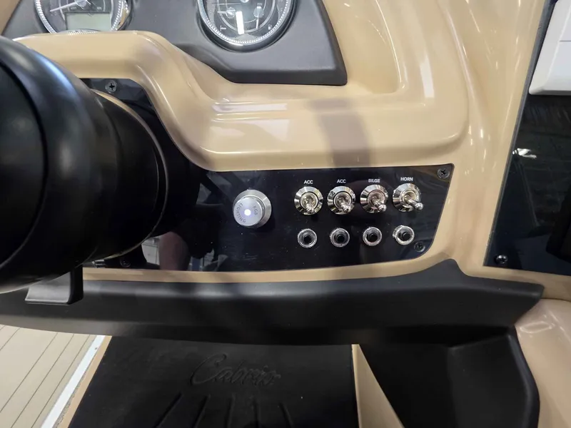 Slide: The Image of Dashboard of 2026 Barletta Cabrio 22QC with switches and gauges. - 17