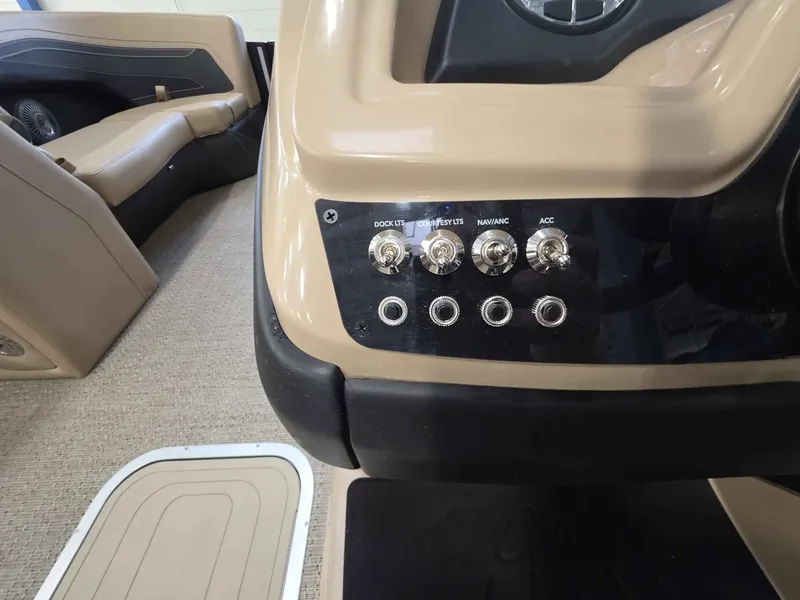Slide: The Image of 2026 Barletta Cabrio 22QC control panel with switches and ports. - 19