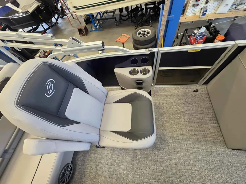 Slide: The Image of Interior of 2026 Barletta ARIA 20UC with gray seat and cup holders. - 16